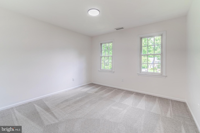 12209 Lake James Dr, Herndon, VA 20171 - spare room featuring baseboards and light colored carpet