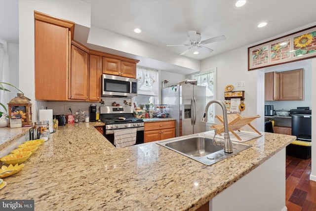 16 W Langhorne Ave, Havertown, PA 19083 - kitchen with stainless steel appliances, a sink, a ceiling fan, recessed lighting, and backsplash