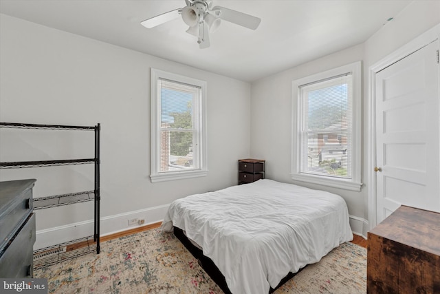 16 W Langhorne Ave, Havertown, PA 19083 - bedroom featuring multiple windows, wood finished floors, and baseboards