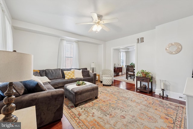16 W Langhorne Ave, Havertown, PA 19083 - living room featuring a ceiling fan, dark wood-style floors, and baseboards