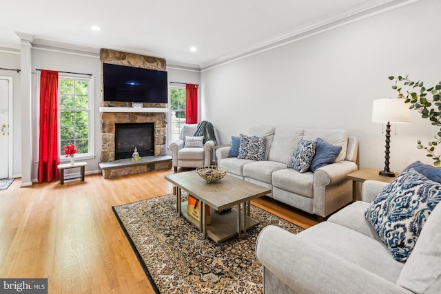 3 Wedgewood Ct, Princeton, NJ 08540 - living area featuring crown molding, light wood-style floors, a stone fireplace, and recessed lighting