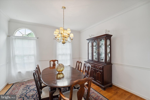 3663 Thomasson Crossing Dr, Triangle, VA 22172 - dining room with a chandelier, crown molding, and light wood-style floors
