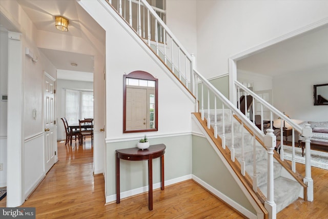 3663 Thomasson Crossing Dr, Triangle, VA 22172 - staircase featuring wood finished floors and baseboards