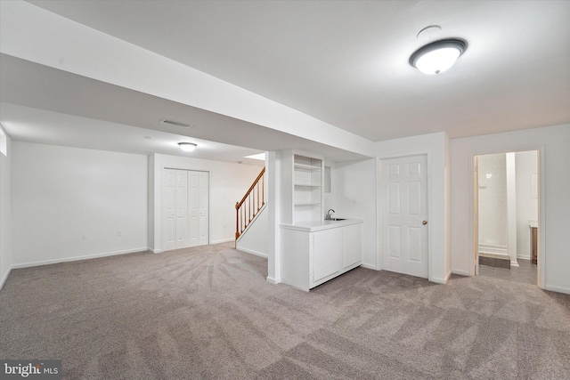 3663 Thomasson Crossing Dr, Triangle, VA 22172 - finished basement with light carpet and stairs