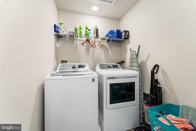 4495 Shakespeare Cir, White Plains, MD 20695 - laundry area with washer and dryer and recessed lighting