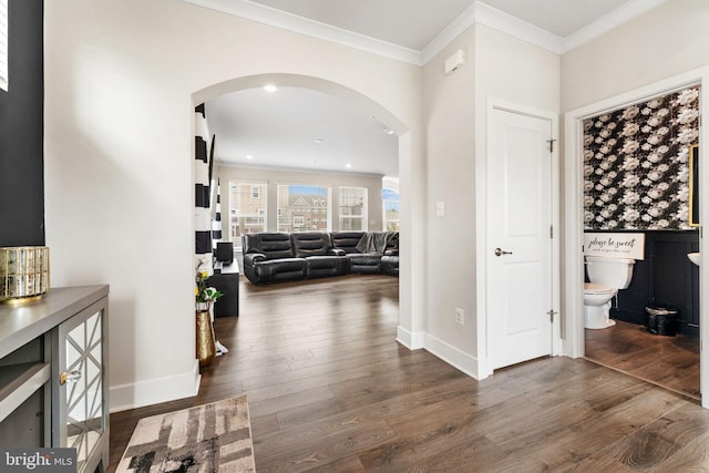 4495 Shakespeare Cir, White Plains, MD 20695 - hallway with arched walkways, dark wood-type flooring, and crown molding