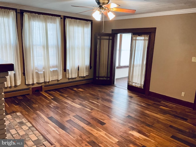 531 S 3rd St, Oakland, MD 21550 - empty room featuring crown molding, ceiling fan, plenty of natural light, dark wood-style floors, and baseboards