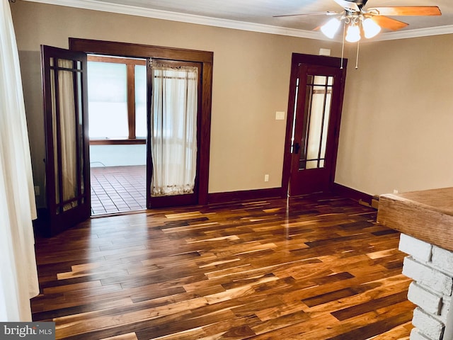 531 S 3rd St, Oakland, MD 21550 - spare room with wood finished floors, crown molding, ceiling fan, and baseboards