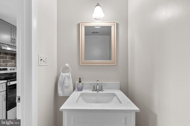 9824 Whetstone Dr, Montgomery Village, MD 20886 - bathroom featuring vanity and decorative backsplash