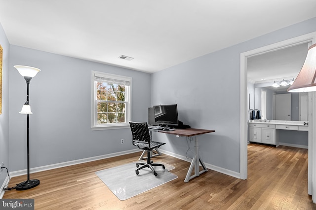 9824 Whetstone Dr, Montgomery Village, MD 20886 - office area featuring light wood-style floors and baseboards