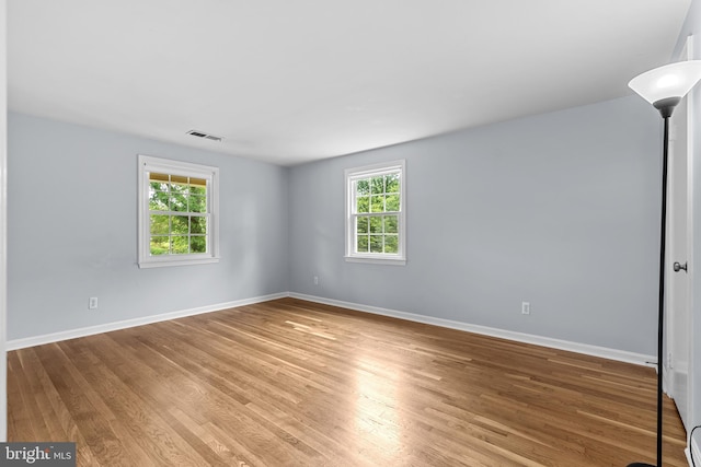 9824 Whetstone Dr, Montgomery Village, MD 20886 - empty room with wood finished floors and baseboards