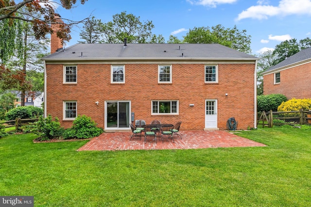 9824 Whetstone Dr, Montgomery Village, MD 20886 - back of property with a patio area, a chimney, and brick siding
