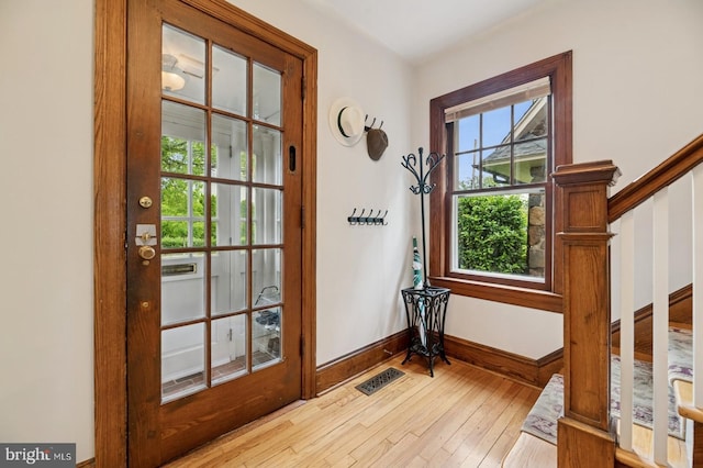 12 Sergeant St, Princeton, NJ 08540 - entryway featuring light wood-style floors, stairs, and baseboards