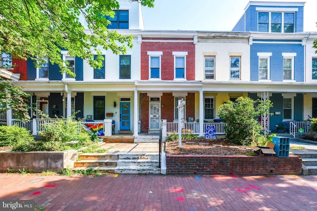 1432 C St SE, Washington, DC 20003 - view of property with brick siding and covered porch
