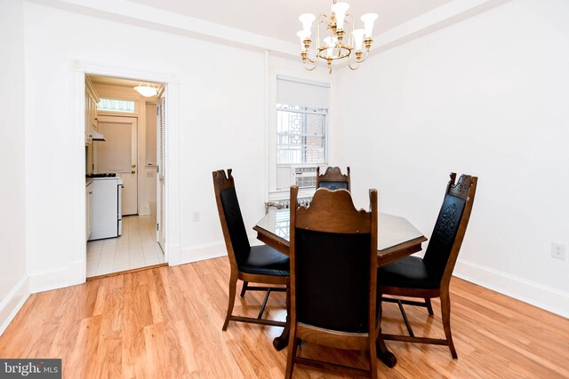 1432 C St SE, Washington, DC 20003 - dining space with a chandelier and light wood finished floors