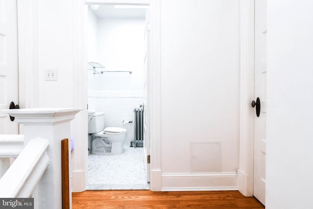1432 C St SE, Washington, DC 20003 - bathroom with radiator and wood finished floors