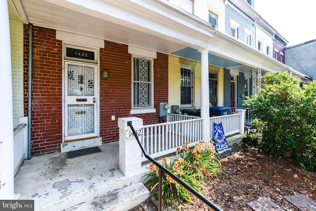 1432 C St SE, Washington, DC 20003 - property entrance with covered porch and brick siding