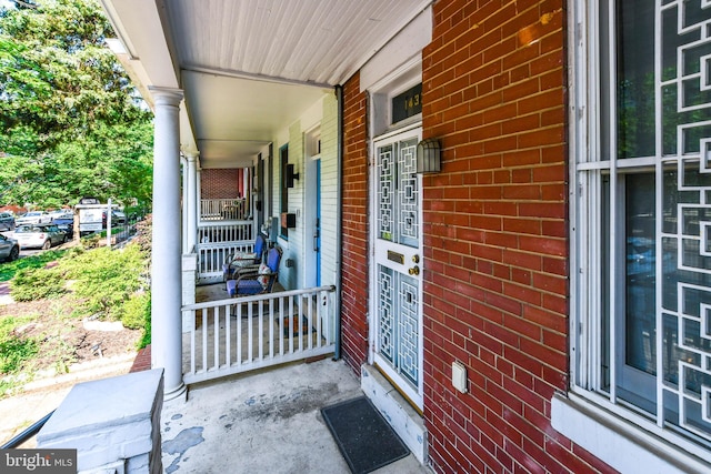 1432 C St SE, Washington, DC 20003 - doorway to property featuring brick siding and a porch
