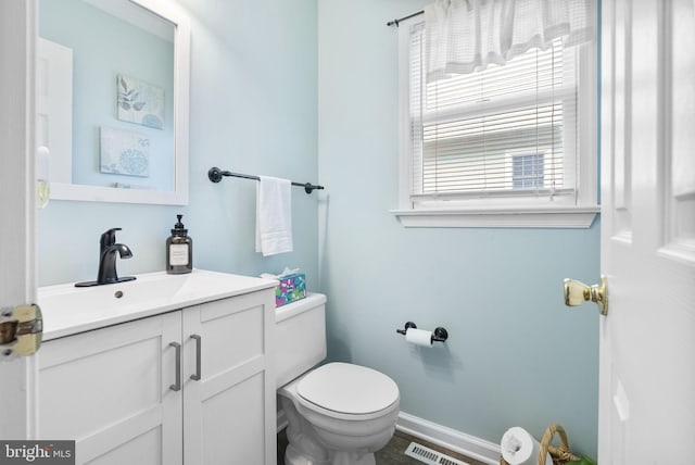 583 Upland St, Pottstown, PA 19464 - bathroom with toilet, vanity, and baseboards