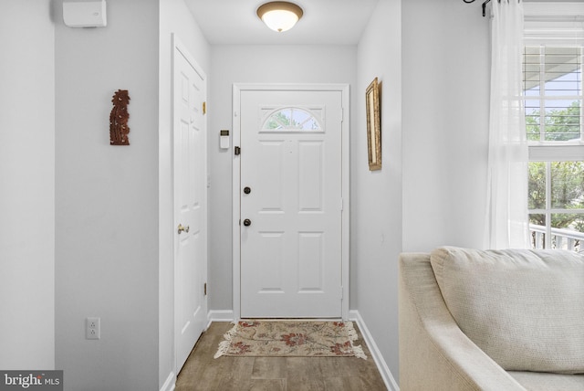 583 Upland St, Pottstown, PA 19464 - doorway to outside with plenty of natural light, wood finished floors, and baseboards