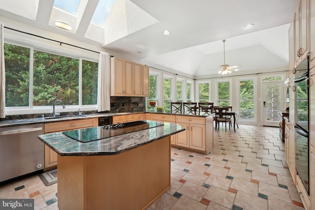 12213 Lake Potomac Ter, Potomac, MD 20854 - kitchen with stainless steel dishwasher, a sink, light brown cabinetry, healthy amount of natural light, and recessed lighting