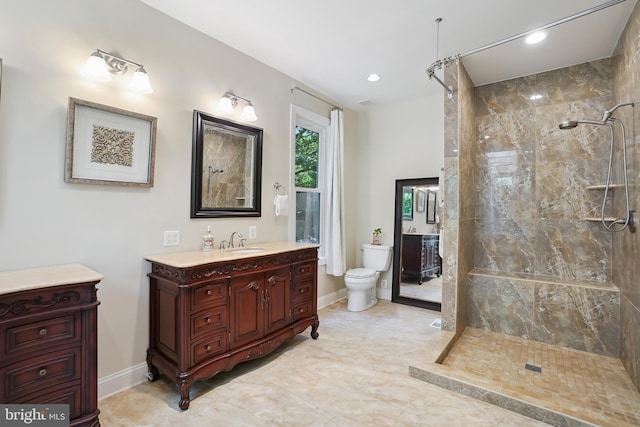 12213 Lake Potomac Ter, Potomac, MD 20854 - bathroom featuring walk in shower, toilet, vanity, baseboards, and recessed lighting