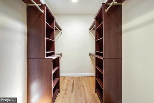 12213 Lake Potomac Ter, Potomac, MD 20854 - spacious closet featuring light wood finished floors