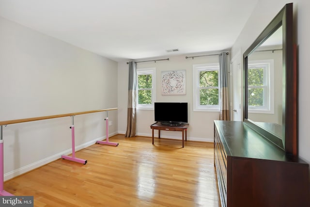 12213 Lake Potomac Ter, Potomac, MD 20854 - living area featuring light wood-style flooring and baseboards