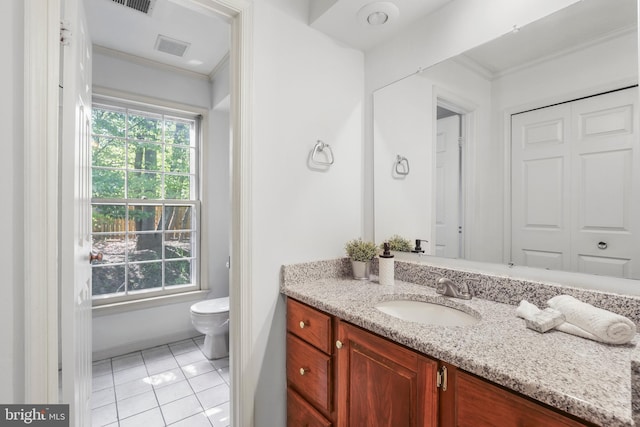 13423 Rippling Brook Dr, Silver Spring, MD 20906 - bathroom with toilet, vanity, tile patterned flooring, and crown molding