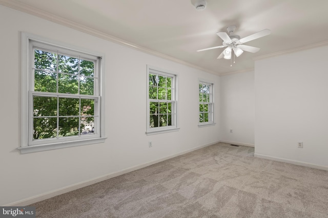 13423 Rippling Brook Dr, Silver Spring, MD 20906 - carpeted empty room with a smoke detector, crown molding, ceiling fan, and baseboards