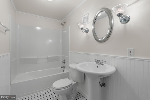 13423 Rippling Brook Dr, Silver Spring, MD 20906 - full bathroom with a wainscoted wall, toilet, tub / shower combination, ornamental molding, and tile patterned flooring