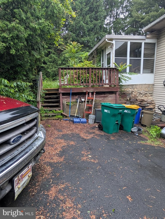 42 Beaver Ave, Enola, PA 17025 - view of side of home featuring a deck, a sunroom, and stairway
