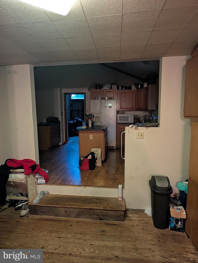 42 Beaver Ave, Enola, PA 17025 - kitchen with dark wood-type flooring, white appliances, a center island, and dark countertops