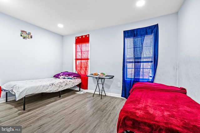 3559 4th St, Baltimore, MD 21225 - bedroom featuring wood finished floors, recessed lighting, and baseboards