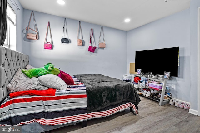3559 4th St, Baltimore, MD 21225 - bedroom with wood finished floors, recessed lighting, and baseboards