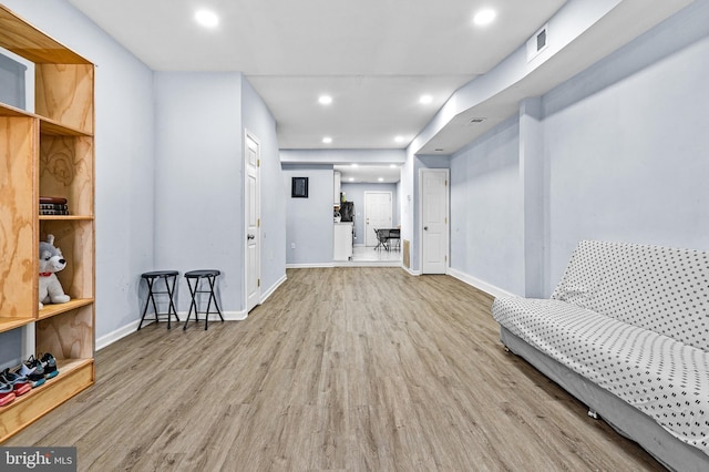 3559 4th St, Baltimore, MD 21225 - living area with wood finished floors, recessed lighting, and baseboards