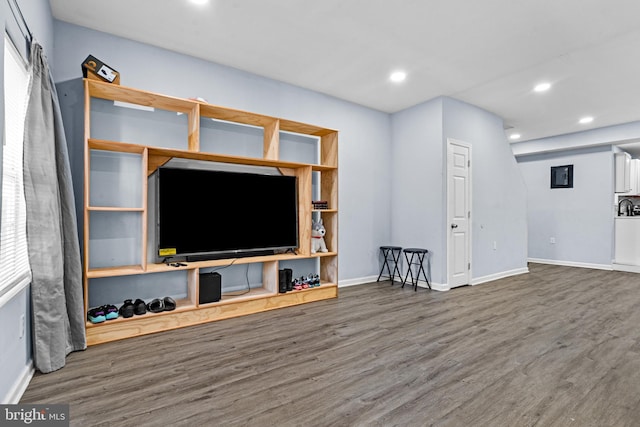 3559 4th St, Baltimore, MD 21225 - unfurnished living room with wood finished floors, recessed lighting, and baseboards