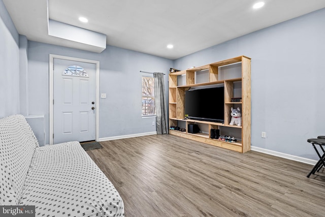 3559 4th St, Baltimore, MD 21225 - living room featuring baseboards, wood finished floors, and recessed lighting
