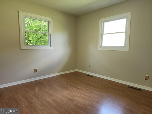 1983 Nault Rd, Dover, DE 19904 - spare room featuring wood finished floors and baseboards
