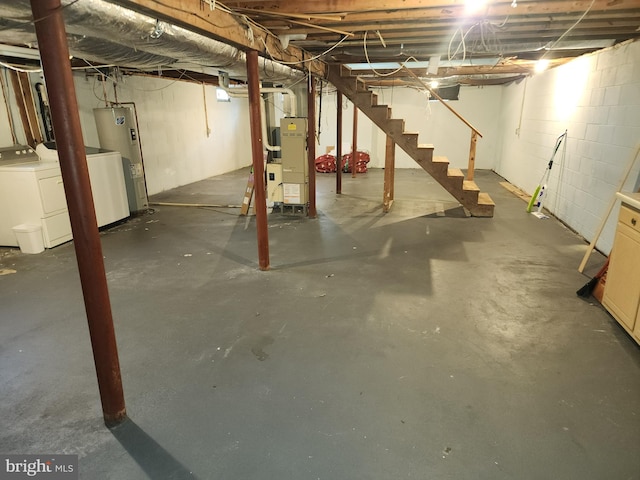 1983 Nault Rd, Dover, DE 19904 - unfinished below grade area with electric water heater, stairway, heating unit, and washing machine and dryer