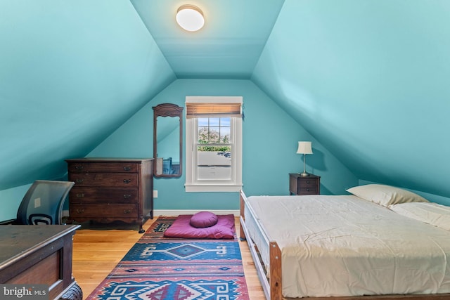 5012 Catalpha Rd, Baltimore, MD 21214 - bedroom featuring wood finished floors and lofted ceiling
