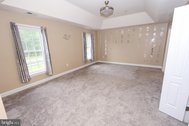 14714 Mount Calvert Rd, Upper Marlboro, MD 20772 - unfurnished room featuring a tray ceiling, carpet, and baseboards