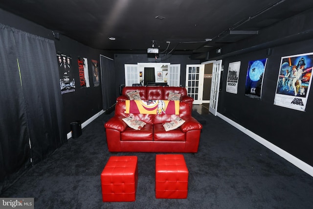 14714 Mount Calvert Rd, Upper Marlboro, MD 20772 - carpeted home theater room featuring baseboards and french doors