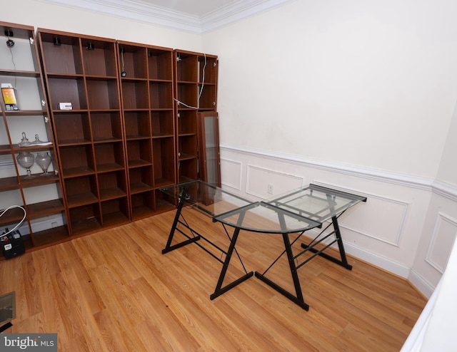 14714 Mount Calvert Rd, Upper Marlboro, MD 20772 - unfurnished room featuring ornamental molding, wood finished floors, wainscoting, and a decorative wall