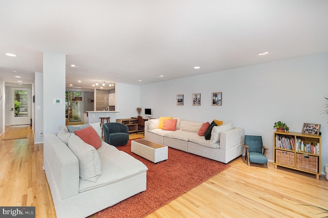 1690 Chimney House Rd, Reston, VA 20190 - living room with light wood-style flooring and recessed lighting