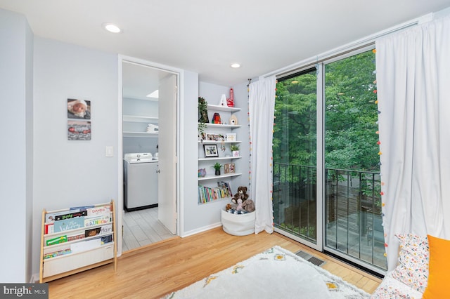 1690 Chimney House Rd, Reston, VA 20190 - doorway to outside with washer / dryer, wood finished floors, and recessed lighting