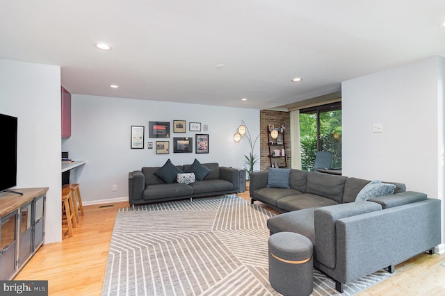 1690 Chimney House Rd, Reston, VA 20190 - living area featuring light wood finished floors and recessed lighting