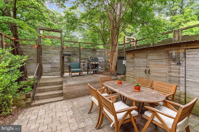 1690 Chimney House Rd, Reston, VA 20190 - view of patio / terrace featuring outdoor dining area and area for grilling