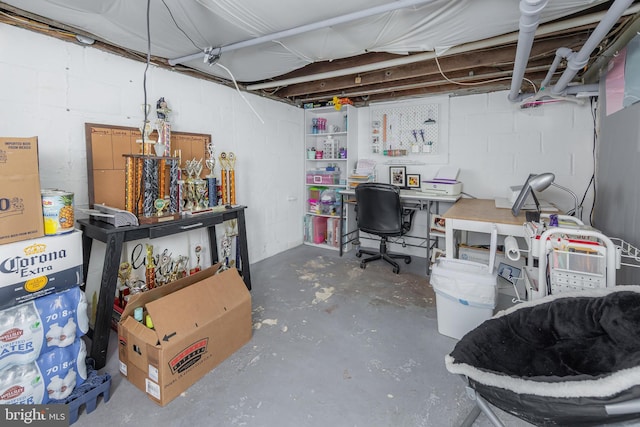 724 S W Ave, Vineland, NJ 08360 - unfinished below grade area with concrete block wall and a desk