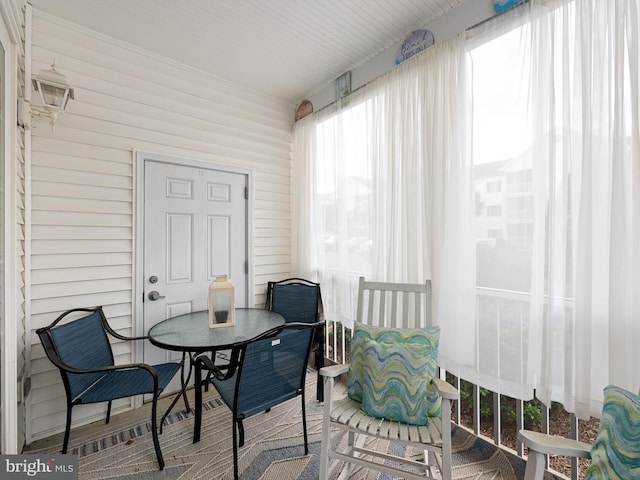 30619 Cedar Neck Rd Unit 1101, Ocean View, DE 19970 - sunroom with outdoor dining space